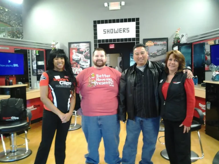 The Sport Clips team supporting Santa's Sleigh Ride