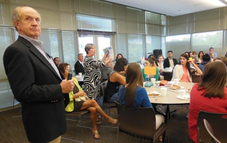 A guest speaker with students at a YOUth LEADership event
