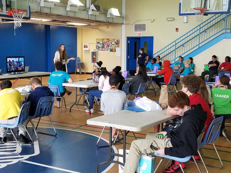 Students listening to a speaker at a YOUth LEADership conference